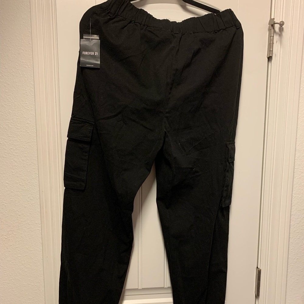 Black ripped joggers never worn